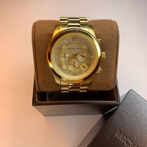 Michael Kore oversized gold watch